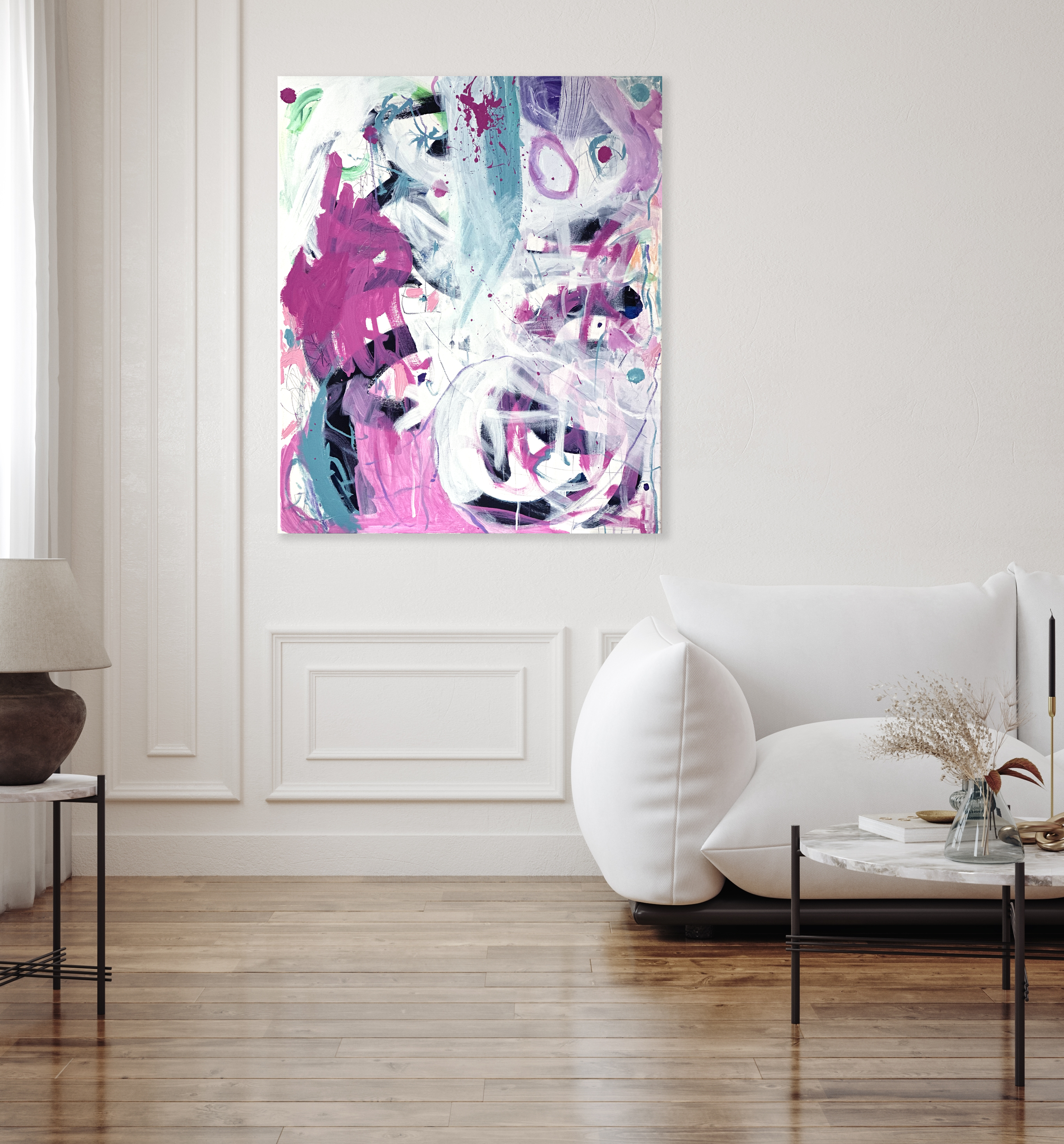 Abstract art work in modern lounge room. White lounge and wooden floors. Bright coloured artwork. Home decor. Abstract pink artwork. Pink painting.