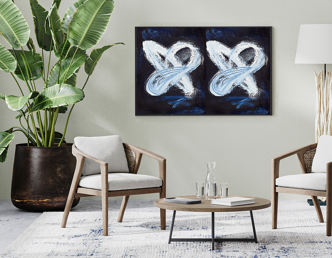 Abstract butterfly print. Artwork hanging in lounge room with palm tree. White rug.Navy and white acrylic paint. Modern abstract art. Interior design. Home decor. Budget art.